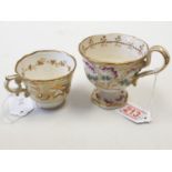 One ornate tea cup plus one coffee cup, thought to be early 19th century