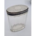 Early Victorian Silver and Glass Dressing Table Powder Jar. Having an oval shape with silver lid