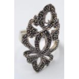 Silver Marcasite ring in pierced filigree form. 925 marking to band. Exceptional piece, size V