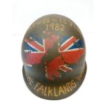 Falkland War Memorial Helmet. Argentinean helmet taken by a British paratrooper during the