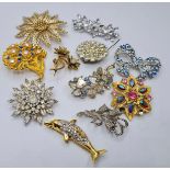 Large Selection of Stone Set Brooches to include Dolphin, Floral, Marcasite etc.