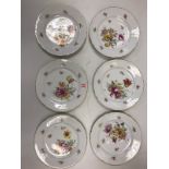 Six Dresden Floral Hand Painted Plates by Ambrosius Lamm. One plate has a small shallow rim chip.