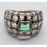 Emerald and diamond ring in 18ct gold, weight 9.6g and Size S