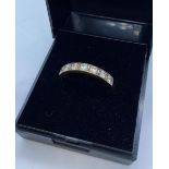 9ct Gold Stone Set Half Eternity Ring. Having Seven Sparkling Clear Stones to Top of Band. Full UK