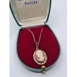 Silver pendant and cameo from Naples Italy. Having a genuine cream cameo mounted in silver on a