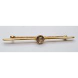 Antique Victorian 15ct gold bar brooch having a large circular faceted peridot to centre. Boxed,