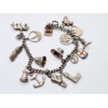 Silver Charm Bracelet with 15 Charms 48.5g 18cms