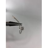 9k white gold ring with diamonds around 0.25cts; 2.6g; size N (ECN 701)
