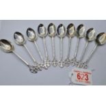 Ten Victorian C.T.Burrows & Son H/M Silver Teaspoon with Fleur De Lys Type Motif. Gross Weight 94