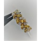 18k gold full eternity ring with yellow sapphires 2.40cts and diamonds 1.20cts; 6.9g; size P