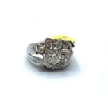 14ct white gold diamond ring with petal design, 0.80ct diamond in total, weight 6.1g and size N