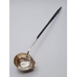 Silver Toddy ladle having horn handle with twist feature. No markings but thought to be Georgian.