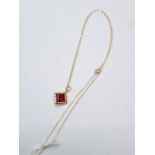 9ct gold red stone pendant on 40cm chain necklace