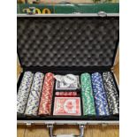 300 chip poker set in aluminium case, 300 chips, 2 poker size card decks, 1 dealer button and 5 dice