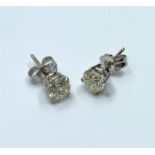 Pair of 18 ct Diamond Stud Earrings with over 1 carat of diamonds set in white gold.