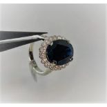 18k white gold cluster ring with sapphire 8.02cts and diamonds 1ct; around 9g ; size L; - (PJ -415)