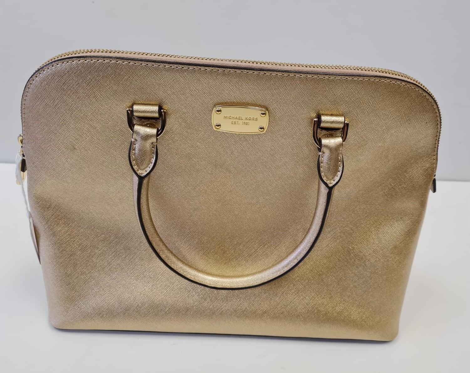 Michael Kors new and unused handbag in a subtle shade of Chantilly gold