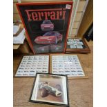 Various framed car racing prints