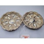 A pair of wackers hall silver ornate Bon Bon dishes, having small cut on rim, 88.2g, 11.5cms