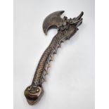 A Chinese bronze ceremonial axe. The handle is in the shape of a traditional Imperial Dragon with