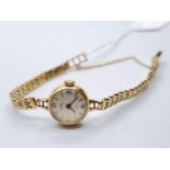 Vintage 9ct gold ladies Audax Fortis watch on a 9ct gold strap, weight 15.5g in full working order