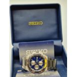 Seiko blue faced chronograph dated 2006 with metal strap in original box.