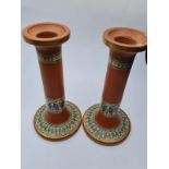 Pair of terracotta candlesticks 18cms tall and 1kg weight with byzantine style decoration.