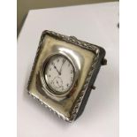 Vintage Cyma pocket watch in silver case display stand