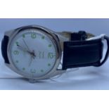 A HMT Janata wrist watch, mechanical movement and leather strap, as new