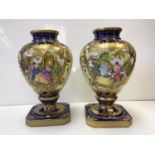 A Pair of highly decorated & gilded vases, painted in Sevres / Royal Vienna style gilded & cobalt