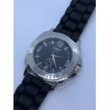 Gents cotton traders black face wristwatch. Having black rubber sports strap. Perfect working order.