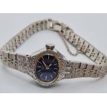 Vintage Ladies Rotary Cocktail Watch. Rare Oval Blue Face Model having Seventeen Jewels and Manual