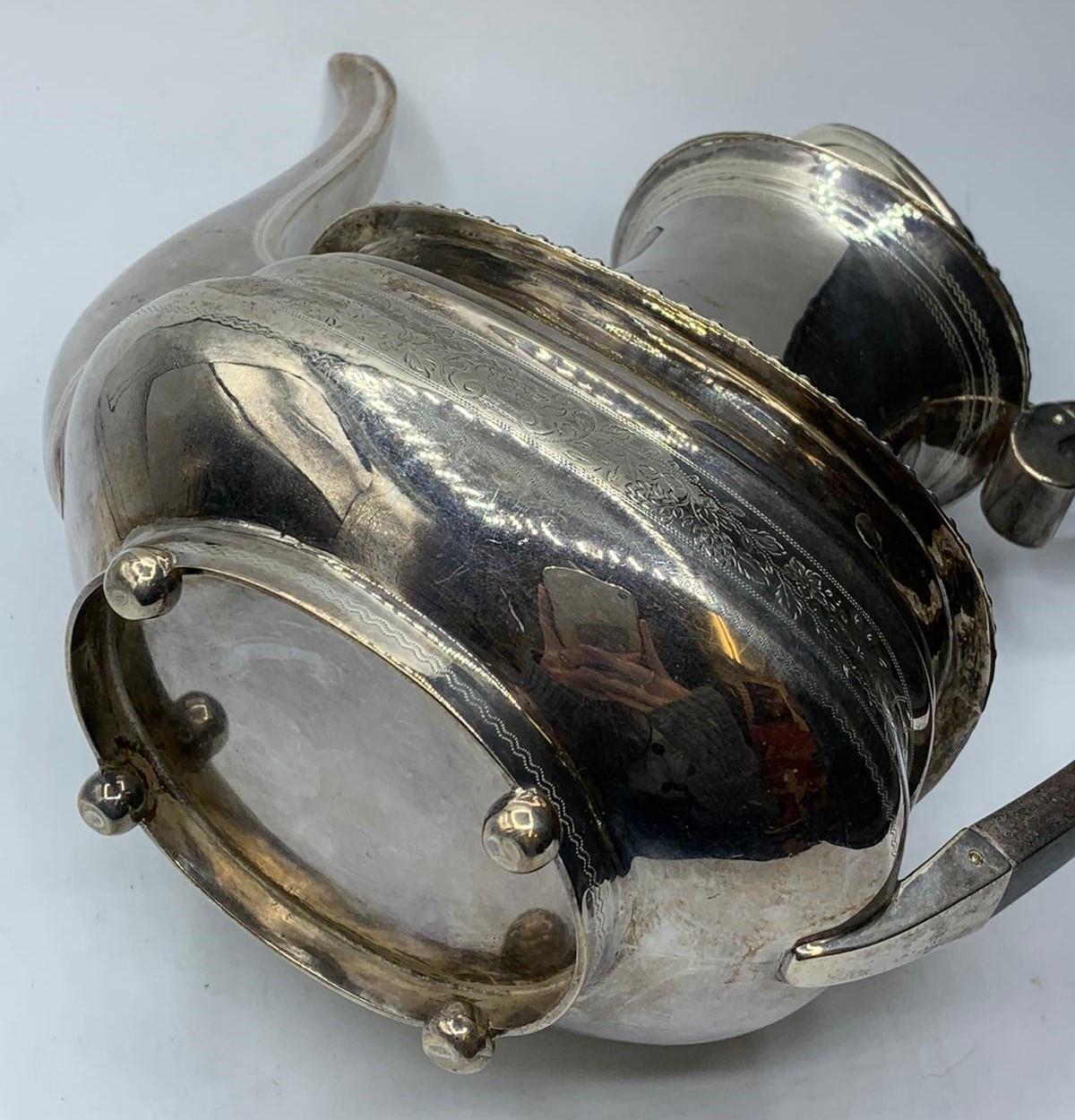 A Regency style silver tea pot with a London 1904 Hallmark good overall condition, weight 704g and - Image 6 of 7