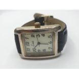 Gentleman's wristwatch by LIMIT. Having square cream face and black 'crocodile' strap. Quartz