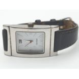 Ladies wristwatch for sale. White face model with square stainless steel case. Brown leather