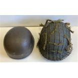 Steel M1 WW2 USA 101st Airborne "Easy Company" helmet. Steel M1 'Easy Company' helmet with net and