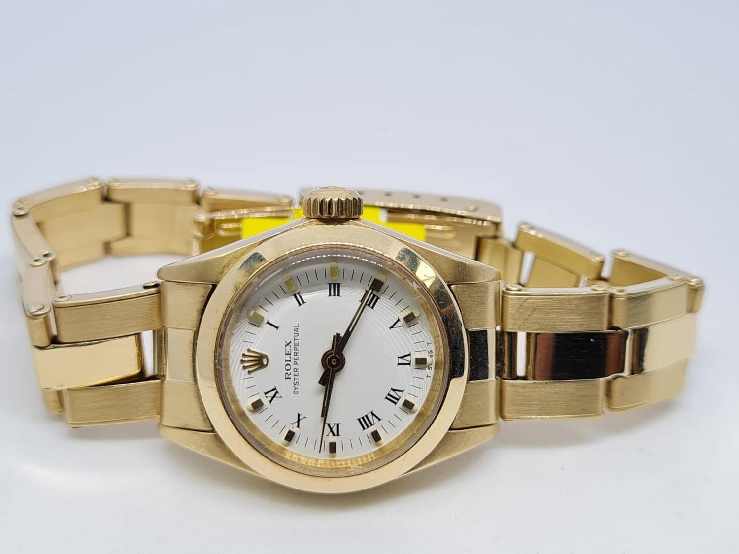 Rolex 14ct All Gold Ladies Watch Factory Dial White. 1980 Model. 26mm diameter. Come with box, no