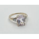 9ct gold RING having a large faceted oval morganite solitaire. 1.5ct to top. Diamonds to