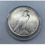 Silver Liberty PEACE DOLLAR 1927. Having the rarer mint mark of Denver. Fine/Extra fine with