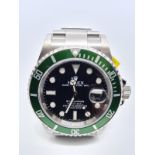 Rolex Submariner Gents Watch with Green Bezel and Black Face. 40mm diameter. This is the