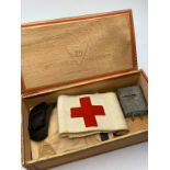 WW2 German Luftshutz (air raid police ) buckle, armband and first aid dressing, as found in an old