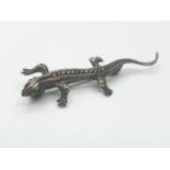 Silver marcasite gecko brooch. Having green periodt coloured eyes. Continental 800 silver. gift