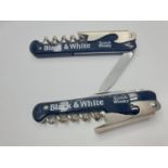 Pair of Large Pen Knives advertising Black and White Whisky, Both Knives having Blade, Corkscrew and