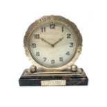 WHITE METAL GOLFING CLOCK AWARDED IN 1933 ON MARBLE STAND, 15CM WIDE AT BASE AND 15CM TALL