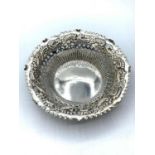 Antique silver bon bon dishes, having scroll repousse work to rim and pierced silver pattern to