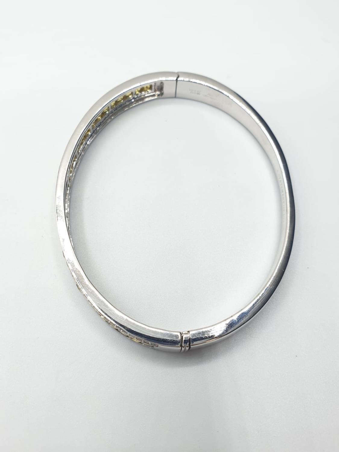 18ct White Gold Hinged Bangle with Channel Set Diamond ( 0.90ct) and Yellow Sapphire Designed by - Image 4 of 5