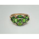 9ct gold ring having large green diopside coloured stones in cluster setting. Full UK hallmark for