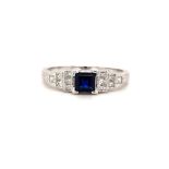 18k white gold ring with 0.35ct blue sapphire centre and 0.18cts diamonds on shoulders, size M1/2