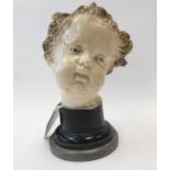 A Ceramic Head Mounted on Plinth Tin Glazed Likely to be Austrian, H: 125mm.