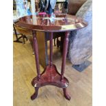 Mahogany occasional TABLE with twist legs and inlaid top. 66cm tall, 40cm diameter.